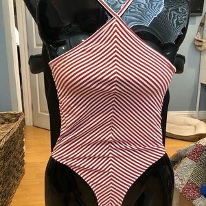 Red and white striped body suit
